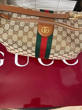 Gucci vanity medium top handle bag.